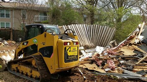 demo barn with skid steer|garage skid steer demo.